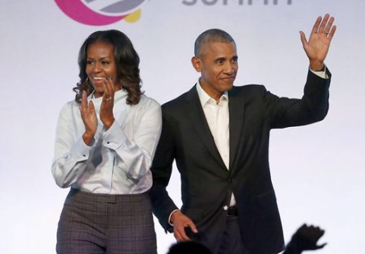 Obamas urge people to vote on 28th wedding anniversary