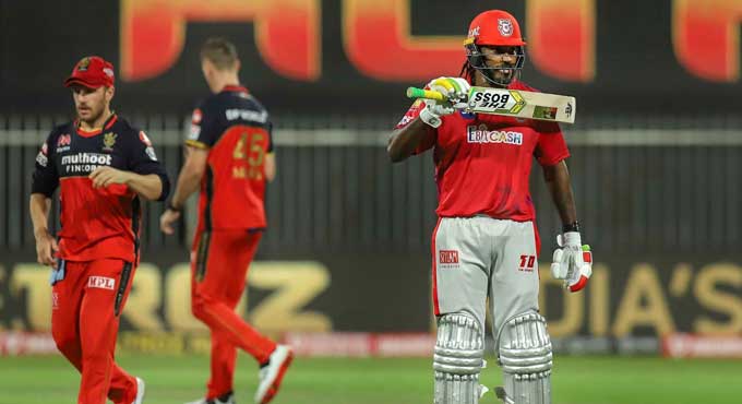 Gayle signals his return to IPL in style, KXIP beats RCB
