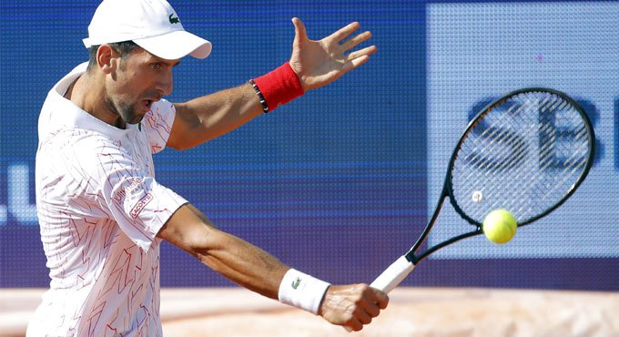 Djokovic ties Federer with 70th win at Roland Garros