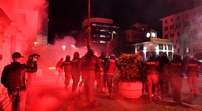 Protesters clash with Italian police over anti-Covid measures