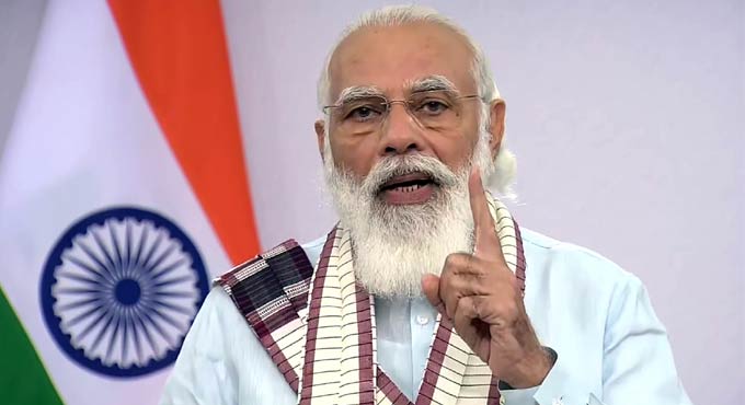 Remain vigilant and follow protocols, virus is still there: PM Modi