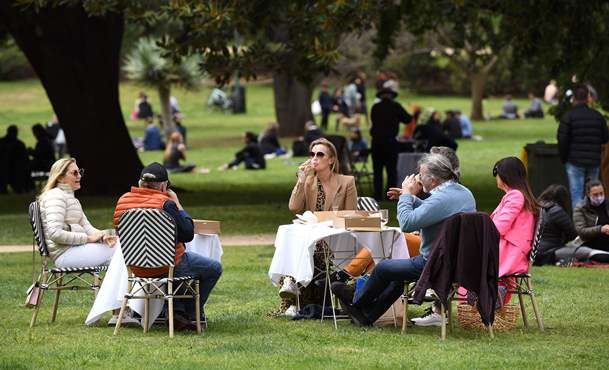 Melbourne eases restrictions after cases drop