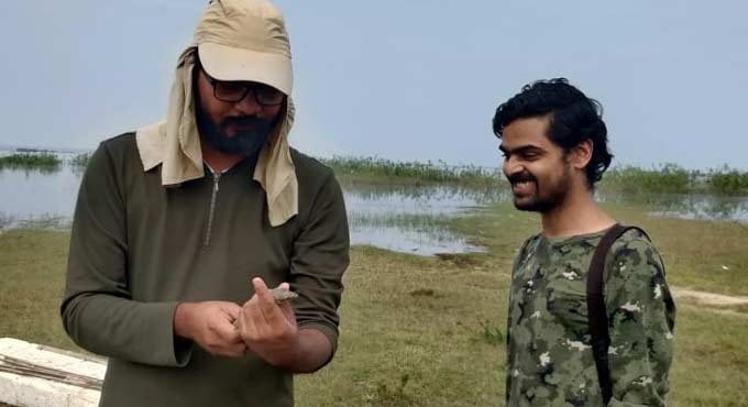 Birders rescue Monitor Lizard at Singur dam