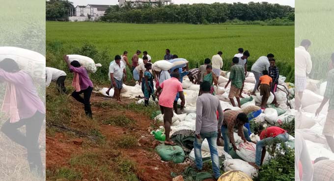 People take away PDS rice after lorry turns turtle at Nalgonda