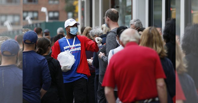 Early US voting surpasses 2016, nine days before election