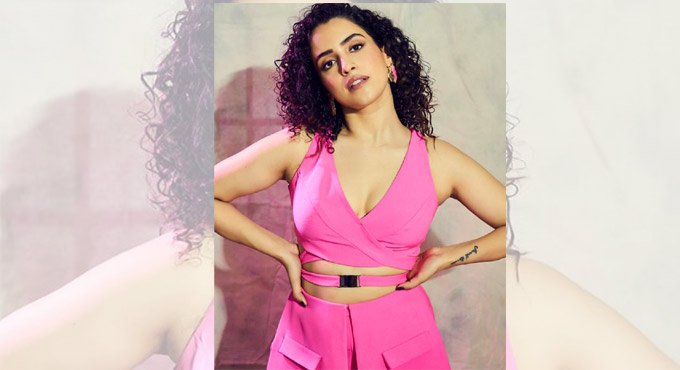 Actress Sanya Malhotra strikes a cool pose in hot pink