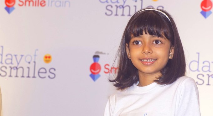 As Aaradhya turns 9, Amitabh shares nine pictures from her growing years
