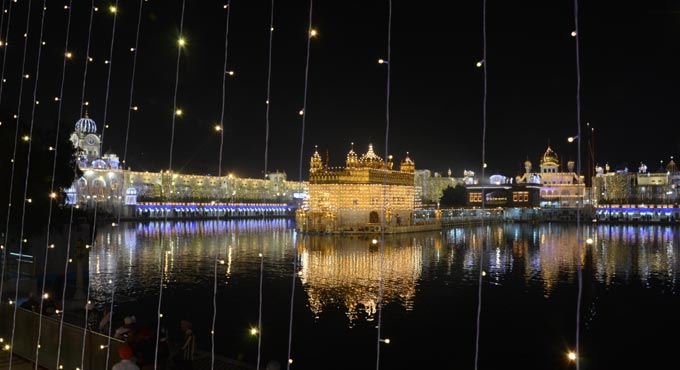 Golden Temple lights up, but fireworks restrained