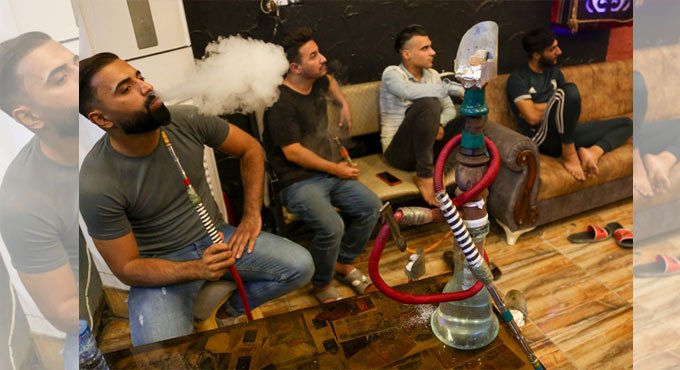 Holy smoke: Waterpipes keep bubbling in Iraqi shrine city 