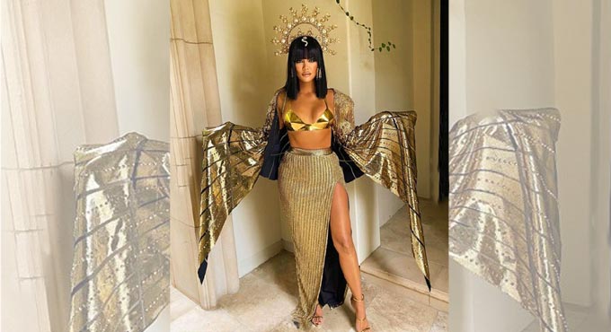 Khloe denies she’s pregnant as she reveals Halloween costume