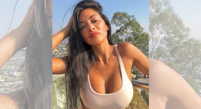 Nicole Scherzinger flaunts hourglass figure at yoga