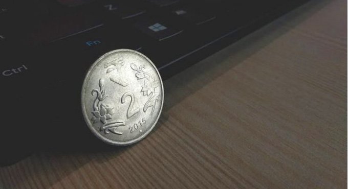 Rupee slumps 33 paise to 74.74 against US dollar in early trade