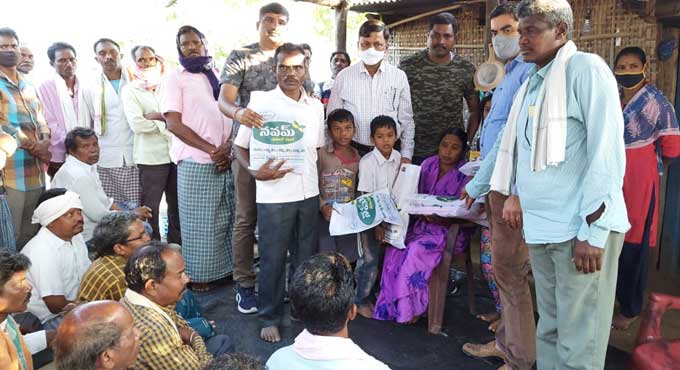 Clothes given to sister of former Maoist in Asifabad