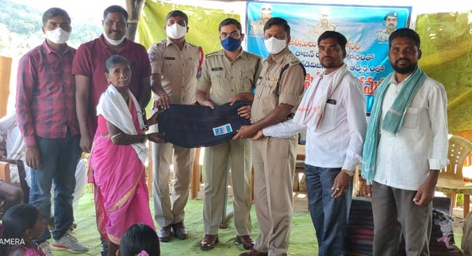 Blankets distributed to tribals in Asifabad