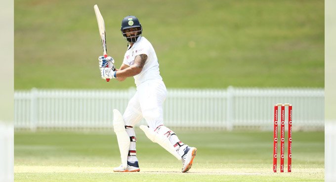 Saha hits half-century, forces a draw