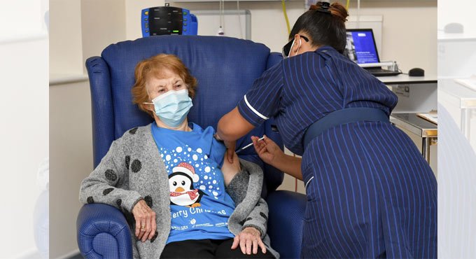 First patient in UK receives Pfizer COVID-19 vaccine