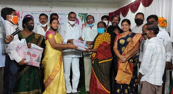 MLAs distribute Christmas gift packs in Khammam
