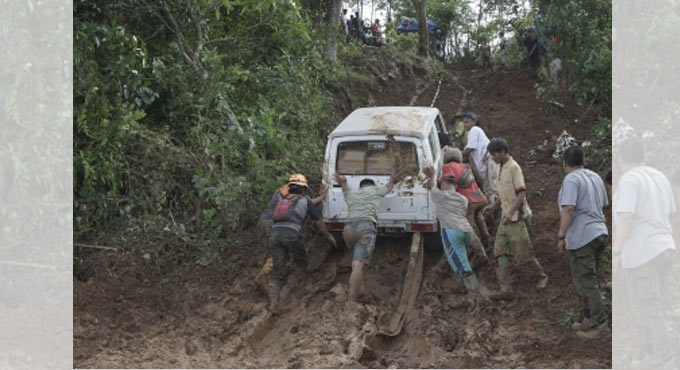 10 workers trapped as landslides hit Indonesian coal mine