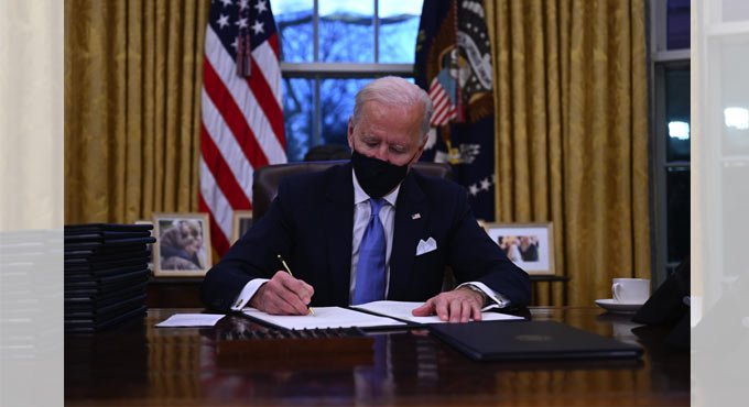 Biden signs 15 executive orders, reversing Trump’s key policies