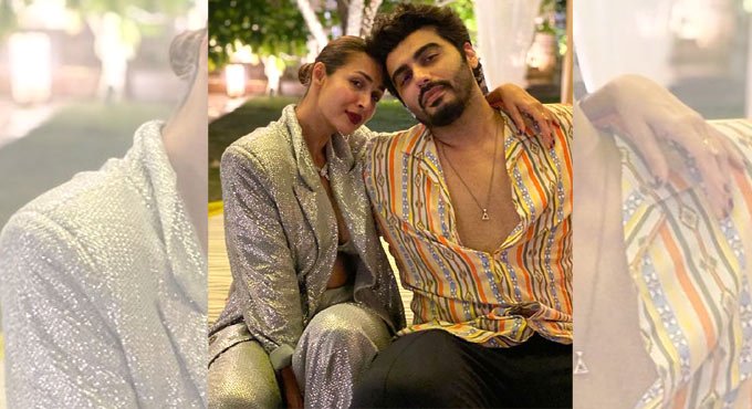 Malaika Arora poses with Arjun Kapoor as she greets for New Year