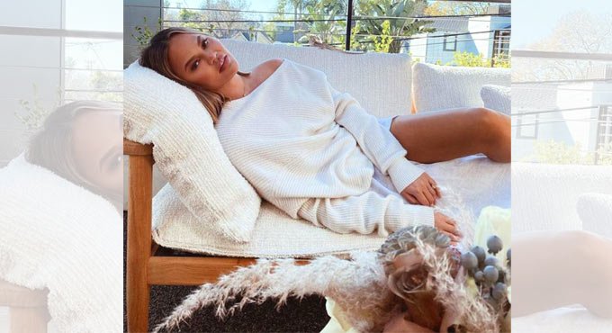 Model Chrissy Teigen sparkles in all-white ensemble