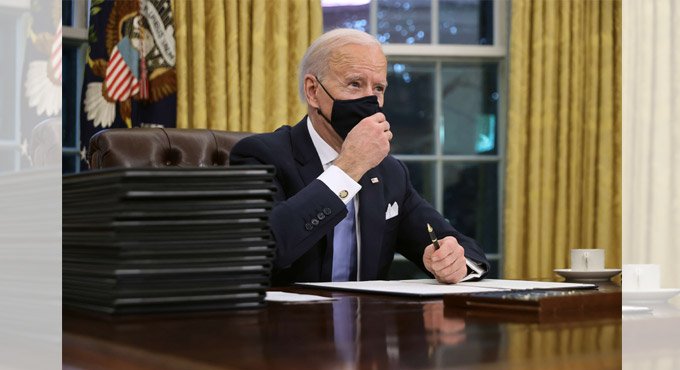 Biden signs executive order rejoining Paris climate agreement