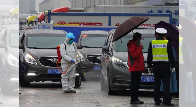 WHO teams visits Wuhan food market in search of virus clues