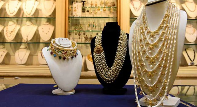 Three cops arrested for looting jewellers in UP