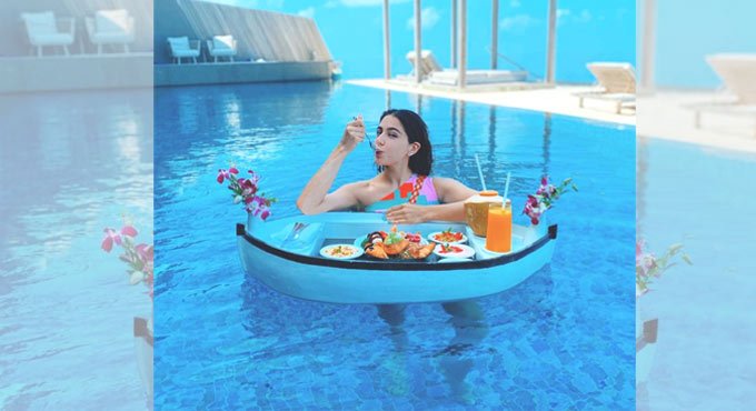 Sara Ali Khan stuns in multi-coloured bikini, enjoys floating breakfast