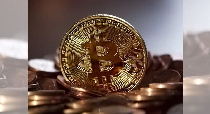 Bitcoin’s market value tops $1 trillion