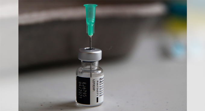 Japan formally approves its first COVID-19 vaccine