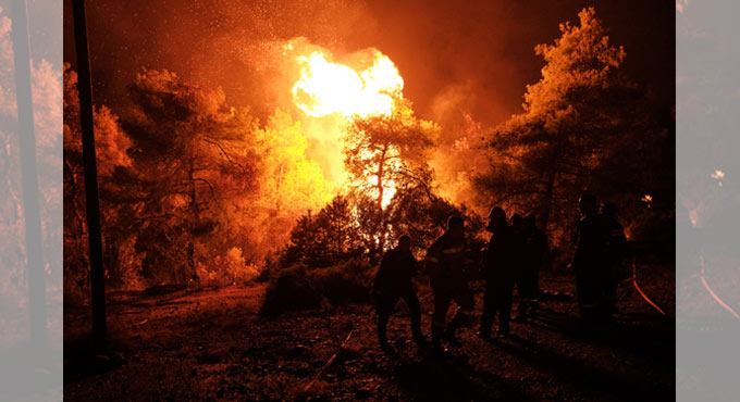 Child dies in Greek migrant camp fire