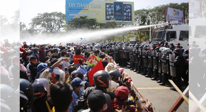 Myanmar protesters march again, defying ban on gatherings