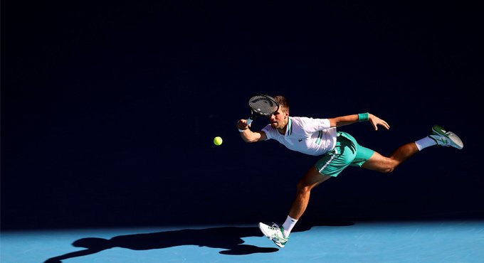 Djokovic wears down a fighting Tiafoe