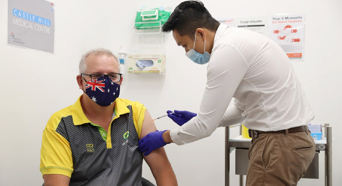 Australia begins coronavirus vaccinations; Scott Morrison gets jab