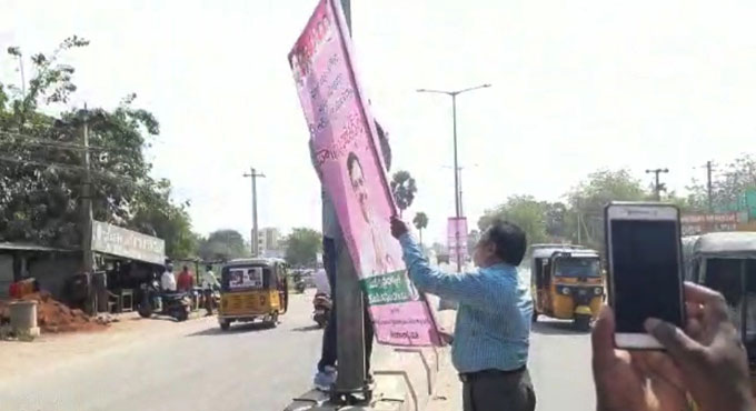 MCC violation: TRS flags, banners removed at Nalgonda
