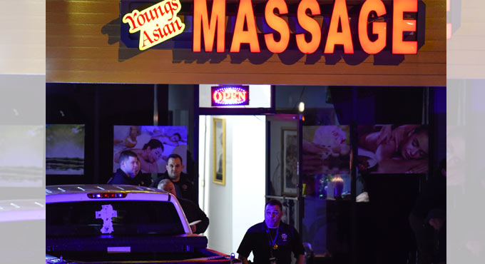 Georgia massage parlor shootings leave 8 dead; man captured