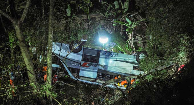 Indonesia bus plunges into a ravine, killing 27 pilgrims