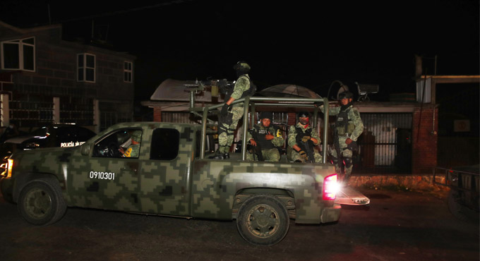 Gunmen ambush police convoy near Mexico City, killing 13