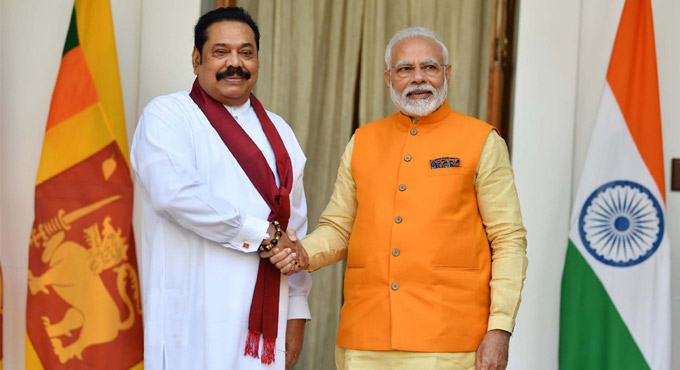 Modi, Rajapaksa agree on regular bilateral contact