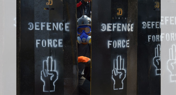 Myanmar junta kills more protesters, adds Suu Kyi accusation