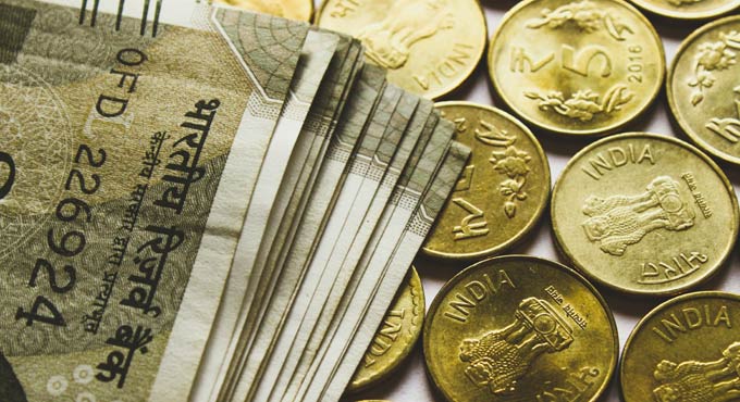 Rupee inches 9 paise higher to 72.70 against US dollar in early trade