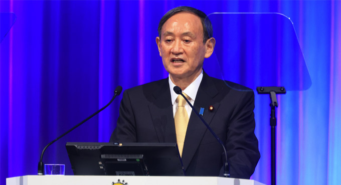 Japan PM vows no virus rebound as emergency measures end