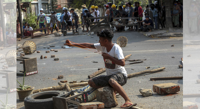 Myanmar police fire tear gas, rubber bullets at protestors