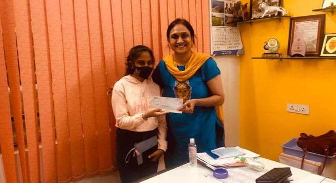 Teenager adopts peacock at Nehru Zoo