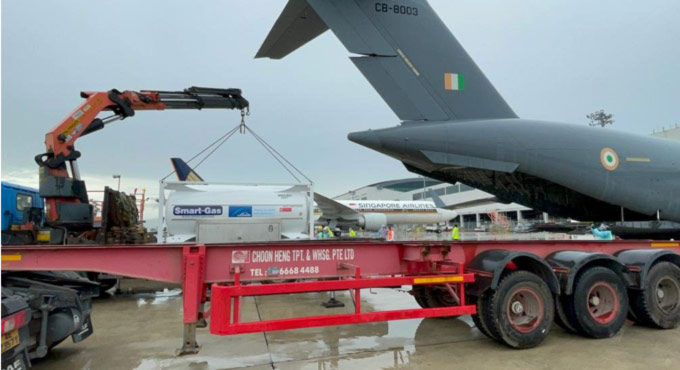 4 cryogenic tanks for transporting oxygen being airlifted from Singapore