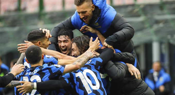 Inter Milan continue march to title, Juve sink Genoa