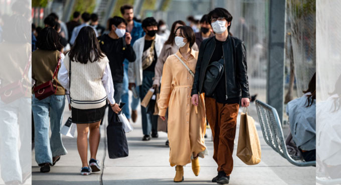 Japan shuts stores, bars, theatres to slow virus surge
