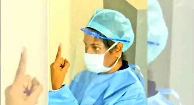DMK MP Kanimozhi, other COVID-19 affected people in TN vote wearing PPE kit