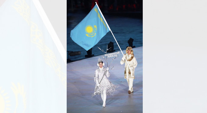 Kazakh flag: Gold sun above a steppe eagle
